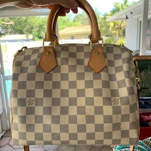 Classy white Louis Vuitton bag